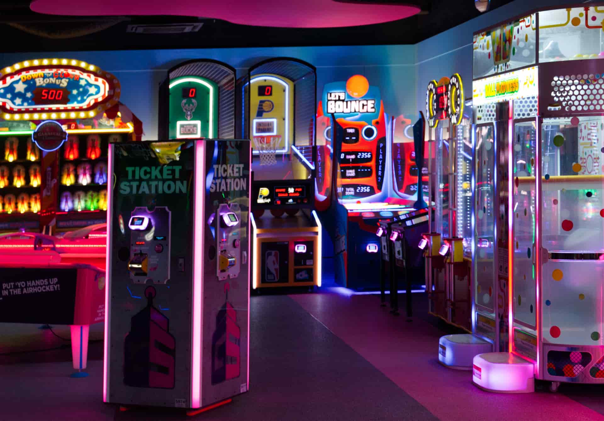 A brightly lit arcade with games and entertainment machines