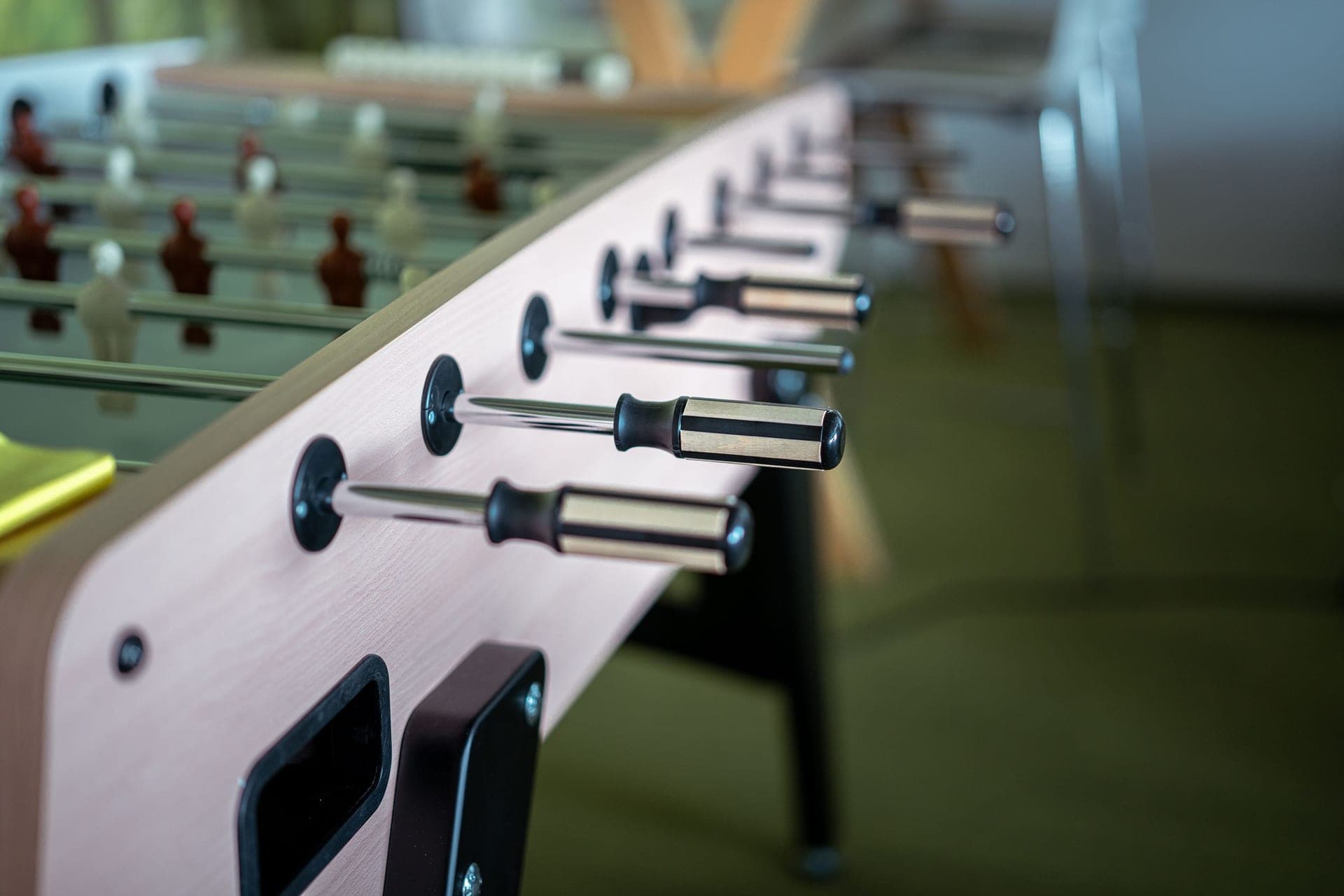 A foosball table in a shared indoor space