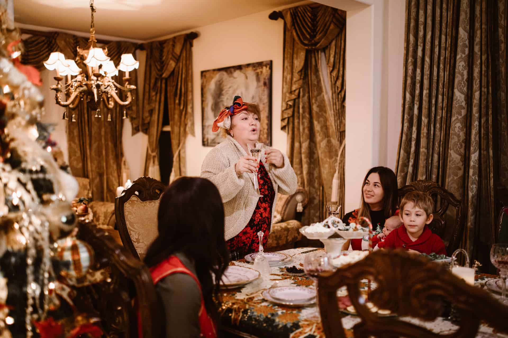 A family gathered around a table for a Christmas celebration
