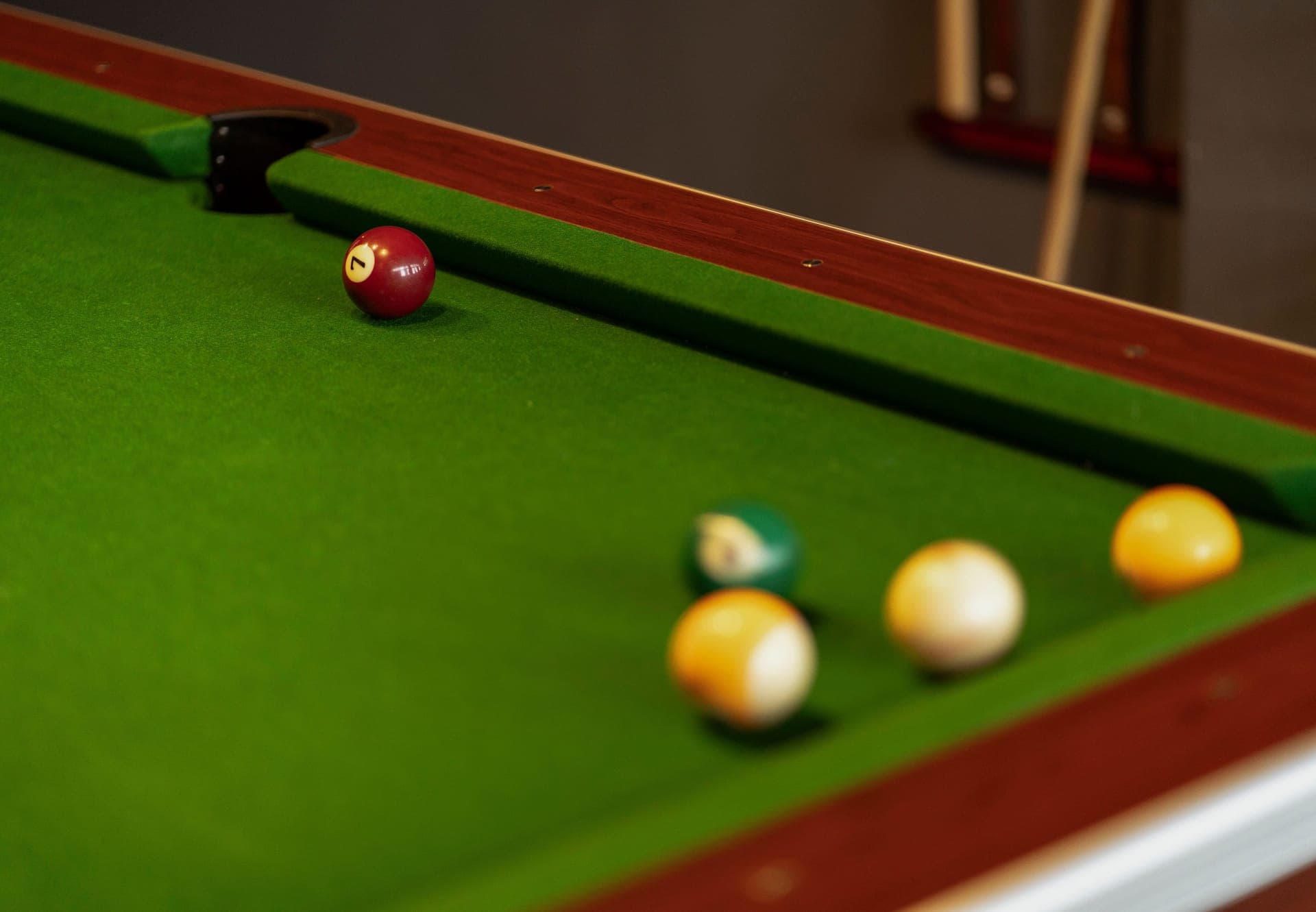 Billiard balls on a green snooker table