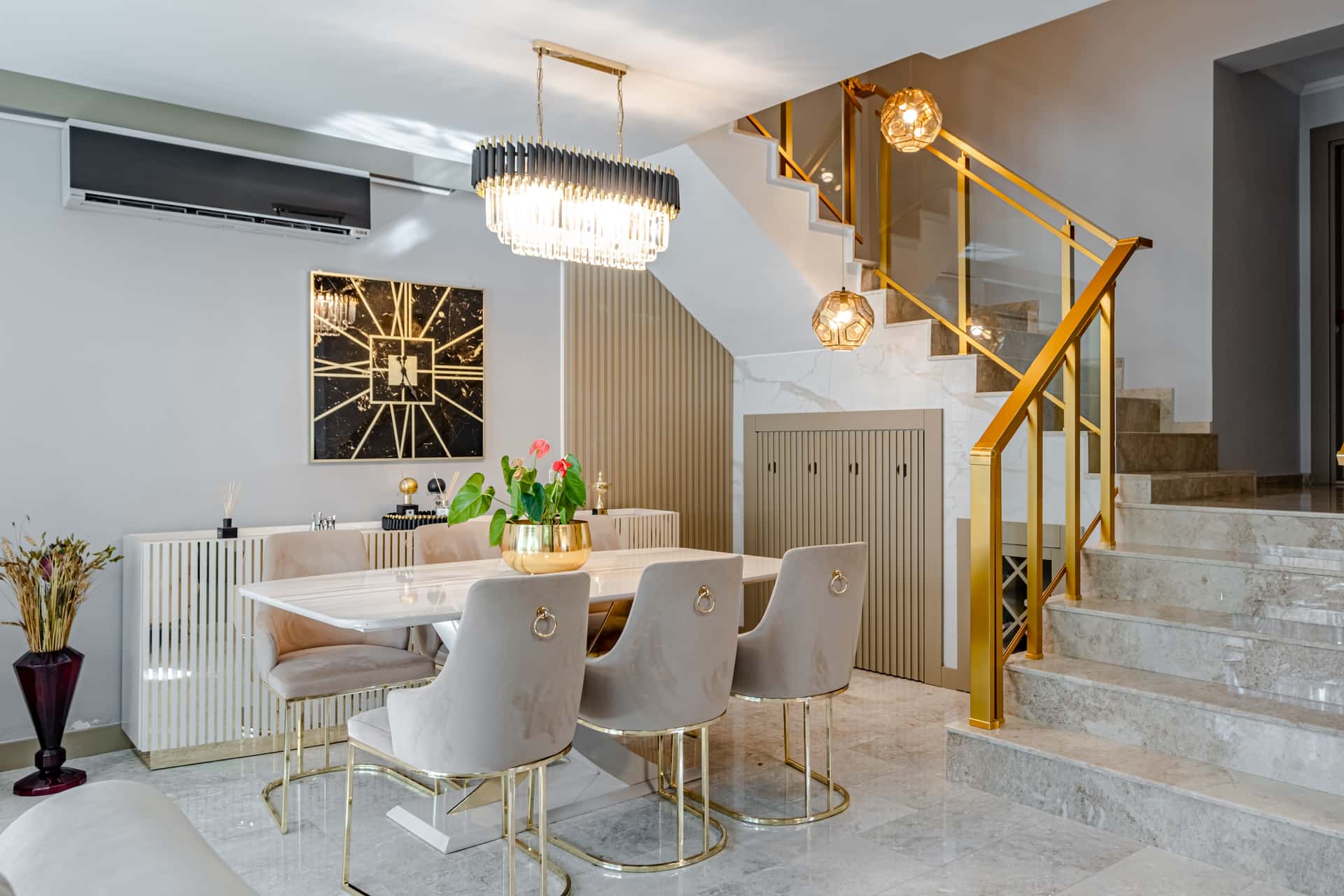 A modern dining room with a large table and clear floor space